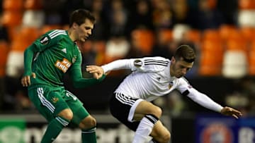 VALENCIA, SPAIN - FEBRUARY 18: Jose Gaya (R) of Valencia competes for the ball with Thomas Murg of Rapid Vienna during the UEFA Europa League round of 32 first leg match between Valencia CF and Rapid Vienna at Estadi de Mestalla on February 18, 2016 in Valencia, Spain. (Photo by Fotopress/Getty Images)