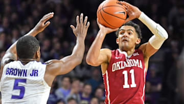 MANHATTAN, KS - JANUARY 16: Trae Young #11 of the Oklahoma Sooners shoots the ball against Barry Brown #2 of the Kansas State Wildcats during the first half on January 16, 2018 at Bramlage Coliseum in Manhattan, Kansas. (Photo by Peter G. Aiken/Getty Images)