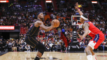 Miami Heat forward Jimmy Butler (22) looks on with the basketball against Washington Wizards guard Bradley Beal (3)(Sam Navarro-USA TODAY Sports)
