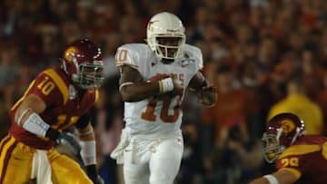 Texas Longhorn quarterback Vince Young scrambles for a gain during the USC Trojans game versus Texas Longhorns in the Rose bowl game and BCS National Championship at the Rose Bowl in Pasadena, CA. The Texas Longhorns defeated the USC Trojans 41-38. (Photo by John Cordes/Icon SMI/Icon Sport Media via Getty Images)