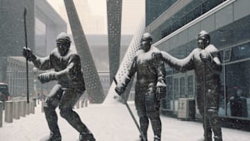 Feb 10, 2018; Toronto, Ontario, CAN; Statues of Mats Sundin and Red Kelly and Frank Mahovlich on Legends Row outside the Air Canada Centre as snow falls before the Toronto Maple Leafs game against the Ottawa Senators at Air Canada Centre. Mandatory Credit: Tom Szczerbowski-USA TODAY Sports