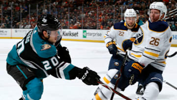 ANAHEIM, CA - OCTOBER 21: Pontus Aberg #20 of the Anaheim Ducks takes a shot on net against Rasmus Dahlin #26 of the Buffalo Sabres during the game on October 21, 2018 at Honda Center in Anaheim, California. (Photo by Debora Robinson/NHLI via Getty Images)