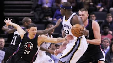 Mar 19, 2016; Memphis, TN, USA; Los Angeles Clippers guard Austin Rivers (25) steals the ball from Memphis Grizzlies forward Zach Randolph (50) during the first half at FedExForum. Mandatory Credit: Justin Ford-USA TODAY Sports
