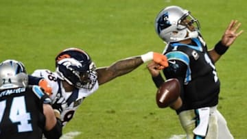 Feb 7, 2016; Santa Clara, CA, USA; Carolina Panthers quarterback Cam Newton (1) has his pass knocked down by Denver Broncos outside linebacker Von Miller (58) during the fourth quarter in Super Bowl 50 at Levi
