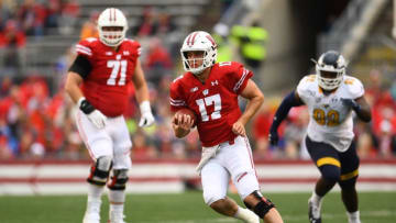 MADISON, WISCONSIN - OCTOBER 05: Jack Coan #17 of the Wisconsin Badgers runs for yards during the first half against the Kent State Golden Flashes at Camp Randall Stadium on October 05, 2019 in Madison, Wisconsin. (Photo by Stacy Revere/Getty Images)