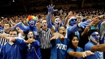 Feb 15, 2014; Durham, NC, USA; Duke Blue Devils fans also know as Cameron Crazies taunt the Maryland Terrapins as they warm up before their game against Duke at Cameron Indoor Stadium. Mandatory Credit: Mark Dolejs-USA TODAY Sports