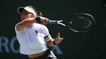INDIAN WELLS, CALIFORNIA - MARCH 13: Bianca Andreescu of Canada in action against Garbine Muguruza of Spain during their women's singles quarter final match on day ten of the BNP Paribas Open at the Indian Wells Tennis Garden on March 13, 2019 in Indian Wells, California. (Photo by Clive Brunskill/Getty Images)