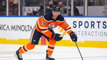 EDMONTON, AB - DECEMBER 07: Tyson Barrie #22 of the Edmonton Oilers skates against the Minnesota Wild during the third period at Rogers Place on December 7, 2021 in Edmonton, Canada. (Photo by Codie McLachlan/Getty Images)