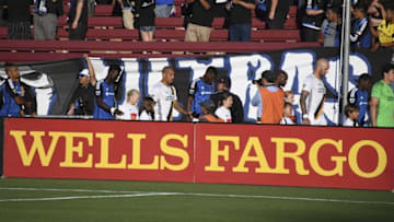 June 25, 2016; Stanford, CA, USA; Wells Fargo kids escort Los Angeles Galaxy and San Jose Earthquakes players before the match at Stanford Stadium. Mandatory Credit: Kyle Terada-USA TODAY Sports