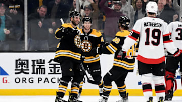Nov 9, 2021; Boston, Massachusetts, USA; Boston Bruins center Patrice Bergeron (37) celebrates with right wing David Pastrnak (88) after scoring a goal against the Ottawa Senators during the second period at the TD Garden. Mandatory Credit: Brian Fluharty-USA TODAY Sports