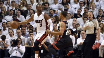 May 9, 2016; Miami, FL, USA; Toronto Raptors guard Norman Powell (24) applies pressure to Miami Heat guard Dwyane Wade (3) during the second quarter in game four of the second round of the NBA Playoffs at American Airlines Arena. Mandatory Credit: Steve Mitchell-USA TODAY Sports
