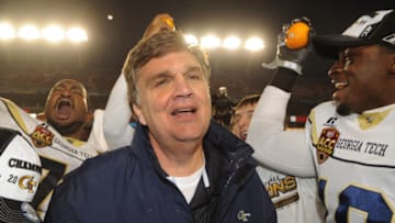 TAMPA, FL - NOVEMBER 28: Coach Paul Johnson of the Georgia Tech Yellow Jackets celebrates a victory against the Clemson Tigers in the 2009 ACC Football Championship Game at Raymond James Stadium on December 5, 2009 in Tampa, Florida. (Photo by Al Messerschmidt/Getty Images)