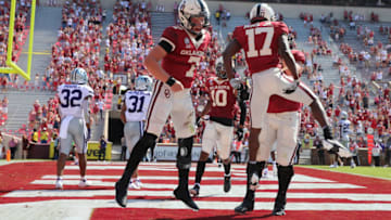 Sep 26, 2020; Norman, Oklahoma, USA; Oklahoma Sooners wide receiver Marvin Mims (17) celebrates with quarterback Spencer Rattler (7) after making a touchdown catch during the first half against the Kansas State Wildcats at Gaylord Family Oklahoma Memorial Stadium. Mandatory Credit: Kevin Jairaj-USA TODAY Sports