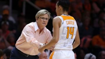 Feb 15, 2016; Knoxville, TN, USA; Tennessee Lady Volunteers head coach Holly Warlick talks to Lady Volunteers guard Andraya Carter (14) during the first quarter against the South Carolina Gamecocks at Thompson-Boling Arena. Mandatory Credit: Randy Sartin-USA TODAY Sports