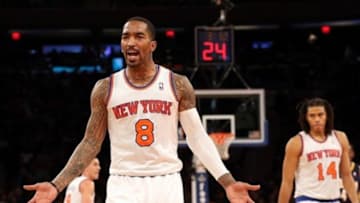 Apr 14, 2013; New York, NY, USA; New York Knicks shooting guard J.R. Smith (8) argues a foul call during the third quarter against the Indiana Pacers at Madison Square Garden. Knicks won 90-80. Mandatory Credit: Anthony Gruppuso-USA TODAY Sports