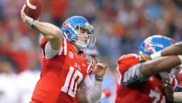 Jan 1, 2016; New Orleans, LA, USA; Mississippi Rebels quarterback Chad Kelly (10) looks to throw a pass against the Oklahoma State Cowboys in the second quarter of the 2016 Sugar Bowl at the Mercedes-Benz Superdome. Mandatory Credit: Chuck Cook-USA TODAY Sports
