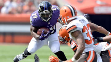 Sep 18, 2016; Cleveland, OH, USA; Baltimore Ravens running back Justin Forsett (29) leaps over the pile during the first half against the Cleveland Browns at FirstEnergy Stadium. Mandatory Credit: Ken Blaze-USA TODAY Sports