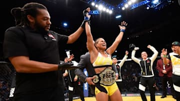 LAS VEGAS, NV - JULY 09: Amanda Nunes of Brazil reacts to her victory over Miesha Tate in their UFC women's bantamweight championship bout during the UFC 200 event on July 9, 2016 at T-Mobile Arena in Las Vegas, Nevada. (Photo by Josh Hedges/Zuffa LLC/Zuffa LLC via Getty Images)