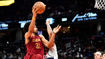 Feb 6, 2023; Washington, District of Columbia, USA; Cleveland Cavaliers center Jarrett Allen (31) shoots over Washington Wizards center Daniel Gafford (21) during the first half at Capital One Arena. Mandatory Credit: Brad Mills-USA TODAY Sports