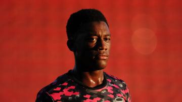 SWINDON, ENGLAND - SEPTEMBER 07: Khayon Edwards of Arsenal looks on as he walks off the pitch after warming up prior to the Papa John's Trophy match between Swindon Town and Arsenal U21 at County Ground on September 07, 2021 in Swindon, England. (Photo by Alex Burstow/Getty Images)