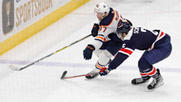 Edmonton Oilers forward Connor McDavid, #97 skates around Washington Capitals defenseman Justin Schultz #2 Mandatory Credit: Geoff Burke-USA TODAY Sports