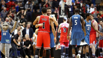 MINNEAPOLIS, MN - FEBRUARY 6: Ricky Rubio #9 of the Minnesota Timberwolves shares a hug with Derrick Rose #1 of the Chicago Bulls during the game on February 6, 2016 at Target Center in Minneapolis, Minnesota. NOTE TO USER: User expressly acknowledges and agrees that, by downloading and or using this Photograph, user is consenting to the terms and conditions of the Getty Images License Agreement. Mandatory Copyright Notice: Copyright 2016 NBAE (Photo by Jordan Johnson/NBAE via Getty Images)