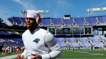 Sep 28, 2014; Baltimore, MD, USA; Carolina Panthers quarterback Cam Newton (1) warms up prior to the game against the Baltimore Ravens at M&T Bank Stadium. Mandatory Credit: Evan Habeeb-USA TODAY Sports