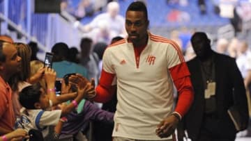 Oct 22, 2014; Orlando, FL, USA; Houston Rockets center Dwight Howard high-fives fans after the game as the Houston Rockets beat the Orlando Magic 90-89 at Amway Center. Mandatory Credit: David Manning-USA TODAY Sports