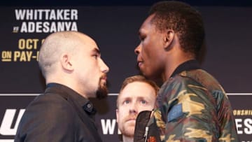 MELBOURNE, AUSTRALIA - AUGUST 15: Robert Whittaker (L) faces off with Israel Adesanya (R) during a UFC Australia press conference at Federation Square on August 15, 2019 in Melbourne, Australia. (Photo by Daniel Pockett/Zuffa LLC/Zuffa LLC via Getty Images)
