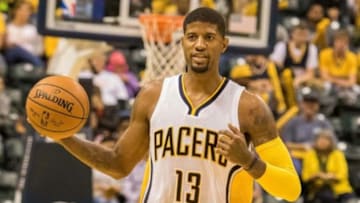 Oct 3, 2015; Indianapolis, IN, USA; Indiana Pacers forward Paul George (13) dribbles the ball in the second half of the game against the New Orleans Pelicans at Bankers Life Fieldhouse. The New Orleans Pelicans beat the Indiana Pacers by the score of 110-105. Mandatory Credit: Trevor Ruszkowski-USA TODAY Sports