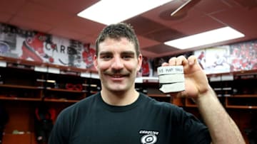RALEIGH, NC - NOVEMBER 23: Jordan Martinook #48 of the Carolina Hurricanes is photographed with the pucks following his first NHL hat trick during an NHL game against the Florida Panthers on November 23, 2018 at PNC Arena in Raleigh, North Carolina. (Photo by Gregg Forwerck/NHLI via Getty Images)