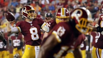 Aug 26, 2016; Landover, MD, USA; Washington Redskins quarterback Kirk Cousins (8) throws a touchdown pass against the Buffalo Bills in the second quarter at FedEx Field. Mandatory Credit: Geoff Burke-USA TODAY Sports