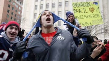 Feb 4, 2015; Boston, MA, USA; New England Patriots tight end Rob Gronkowski (87) poses for a photo with some fans during the Super Bowl XLIX-New England Patriots Parade. Mandatory Credit: Greg M. Cooper-USA TODAY Sports