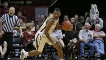 Feb 17, 2016; Tallahassee, FL, USA; Florida State Seminoles guard Xavier Rathan-Mayes (22) controls the ball against the Georgia Tech Yellow Jackets in the first half of play at Donald L. Tucker Center. Mandatory Credit: Glenn Beil-USA TODAY Sports