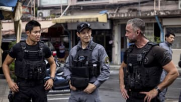 “Thai Hard” – During a trip to Bangkok to train alongside Thailand’s premiere S.W.A.T. team, Hondo and his former military buddy Joe (guest star Sean Maguire) stumble upon a wide-ranging heroin operation with ties to Los Angeles and find themselves on the run from a powerful drug kingpin, on the season premiere of S.W.A.T., Friday, Oct. 7 (8:00-9:00 PM, ET/PT) on the CBS Television Network and available to stream live and on demand on Paramount+. Pictured (L-R): David Lim as Victor Tan and Jay Harrington as David “Deacon” Kay. Photo: Jack Taylor/CBS ©2022 CBS Broadcasting, Inc. All Rights Reserved.
