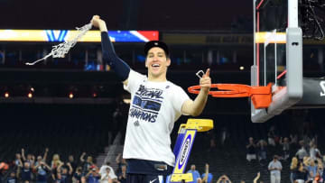 Apr 4, 2016; Houston, TX, USA; Villanova Wildcats guard Ryan Arcidiacono celebrates after cutting down the net after defeating the North Carolina Tar Heels in the championship game of the 2016 NCAA Men