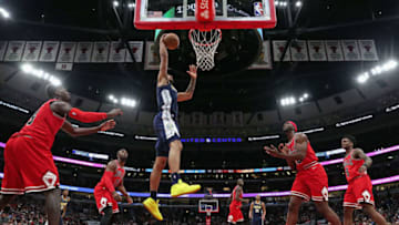 CHICAGO, IL - MARCH 21: Trey Lyles #7 of the Denver Nuggets goes up for a shot against (L-R) Bobby Portis #5, David Nwaba #11, Noah Vonleh #30 and Antonio Blakeney #9 of the Chicago Bulls at the United Center on March 21, 2018 in Chicago, Illinois. The Nuggets defeated the Bulls 135-102. NOTE TO USER: User expressly acknowledges and agrees that, by downloading and or using this photograph, User is consenting to the terms and conditions of the Getty Images License Agreement. (Photo by Jonathan Daniel/Getty Images)