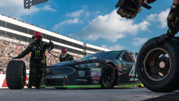 DOVER, DE - OCTOBER 07: The crew of the The #41 Stewart-Haas Racing Ford driven by Kurt Busch go to work during a pit stop in the Gander Outdoors 400 on October 07, 2018, at Dover International Speedway in Dover, DE. (Photo by David Hahn/Icon Sportswire via Getty Images)