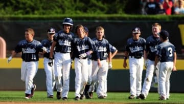 Aug 29, 2015; Williamsport, PA, USA; Mid-Atlantic Region players celebrate after beating the Southwest Region 3-2 at Howard J. Lamade Stadium. Mandatory Credit: Evan Habeeb-USA TODAY Sports