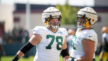 Green Bay Packers tackle/guard Cole Van Lanen (78) and Josh Myers (71) participate in training camp practice with the New Orleans Saints on Wednesday, Aug. 17, 2022, at Ray Nitschke Field in Ashwaubenon, Wis. Samantha Madar/USA TODAY NETWORK-WisconsinGpg Training Camp With Saints 08172022 0009