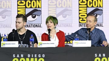 SAN DIEGO, CALIFORNIA - JULY 21: (L-R) Alexander Calvert, Eugenie Ross-Leming and Brad Buckner speak at the "Supernatural" Special Video Presentation and Q&A during 2019 Comic-Con International at San Diego Convention Center on July 21, 2019 in San Diego, California. (Photo by Kevin Winter/Getty Images)