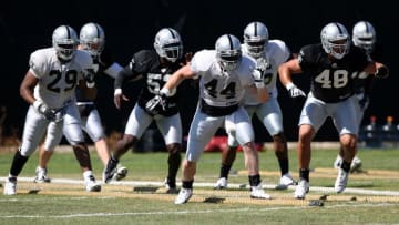 NAPA, CA - AUGUST 5: Members of the Raiders warm up during the Oakland Raiders Training Camp at the Napa Valley Marriott on August 5, 2009 in Napa, California.