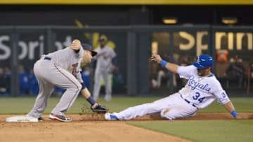 Apr 8, 2016; Kansas City, MO, USA; Minnesota Twins second baseman Brian Dozier (2) gets the force out at second base on Kansas City Royals right fielder Reymond Fuentes (34) in the second inning at Kauffman Stadium. Mandatory Credit: Denny Medley-USA TODAY Sports