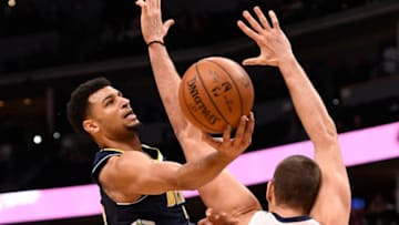 Memphis Grizzlies v Denver NuggetsDENVER, CO - JANUARY 12: Jamal Murray #27 of the Denver Nuggets drives against Marc Gasol #33 of the Memphis Grizzlies at Pepsi Center on January 12, 2018 in Denver, Colorado. NOTE TO USER: User expressly acknowledges and agrees that, by downloading and or using this photograph, User is consenting to the terms and conditions of the Getty Images License Agreement. (Photo by Jamie Schwaberow/Getty Images)Getty ID: 904370192