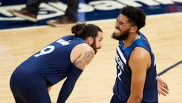 MINNEAPOLIS, MINNESOTA - MARCH 22: Karl-Anthony Towns #32 of the Minnesota Timberwolves reacts to an injury during the first quarter of the game against the Oklahoma City Thunder at Target Center on March 22, 2021 in Minneapolis, Minnesota. NOTE TO USER: User expressly acknowledges and agrees that, by downloading and or using this Photograph, user is consenting to the terms and conditions of the Getty Images License Agreement (Photo by Hannah Foslien/Getty Images)
