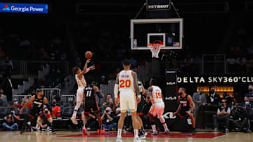 ATLANTA, GEORGIA - OCTOBER 14: Trae Young #11 of the Atlanta Hawks attempts a shot against KZ Okpala #11 of the Miami Heat during the first half as there was a malfunction with the shot clock at State Farm Arena on October 14, 2021 in Atlanta, Georgia. NOTE TO USER: User expressly acknowledges and agrees that, by downloading and or using this photograph, User is consenting to the terms and conditions of the Getty Images License Agreement. (Photo by Kevin C. Cox/Getty Images)