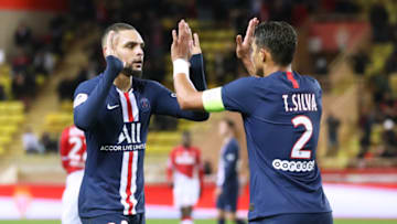 Paris Saint-Germain's French defender Layvin Kurzawa (L) celebrates with Paris Saint-Germain's Brazilian defender Thiago Silva after winning the French L1 football match between Monaco (ASM) and Paris Saint-Germain (PSG) at the Louis II Stadium in Monaco on January 15, 2020. (Photo by Valery HACHE / AFP) (Photo by VALERY HACHE/AFP via Getty Images)