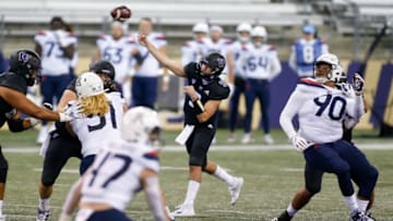 Nov 21, 2020; Seattle, Washington, USA; Washington Huskies quarterback Dylan Morris (9) throws out a pass against the Arizona Wildcats during the first quarter at Alaska Airlines Field at Husky Stadium. Mandatory Credit: Jennifer Buchanan-USA TODAY Sports
