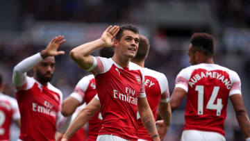 NEWCASTLE UPON TYNE, ENGLAND - SEPTEMBER 15: Granit Xhaka of Arsenal celebrates after scoring a goal to make it 0-1 during the Premier League match between Newcastle United and Arsenal FC at St. James Park on September 15, 2018 in Newcastle upon Tyne, United Kingdom. (Photo by Robbie Jay Barratt - AMA/Getty Images)