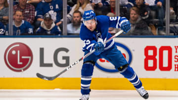 TORONTO, ON - FEBRUARY 1: Cody Ceci #83 of the Toronto Maple Leafs passes the puck against the Ottawa Senators during the second period at the Scotiabank Arena on February 1, 2020 in Toronto, Ontario, Canada. (Photo by Kevin Sousa/NHLI via Getty Images)